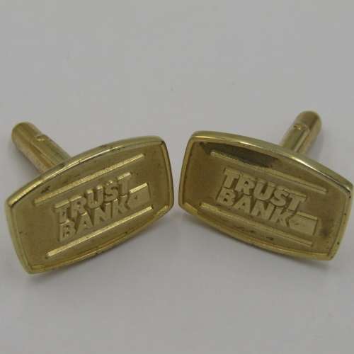 Set of 24 kt gold plated Trust Bank cufflinks