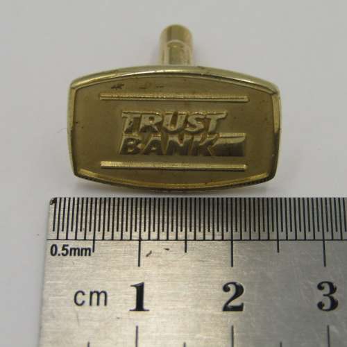 Set of 24 kt gold plated Trust Bank cufflinks