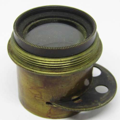 Antique brass camera lens with rotating aperture f11 to f44