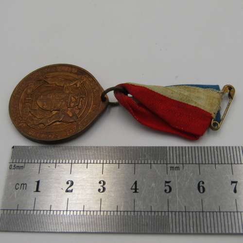 Antique Union of South Africa medallion with ribbon