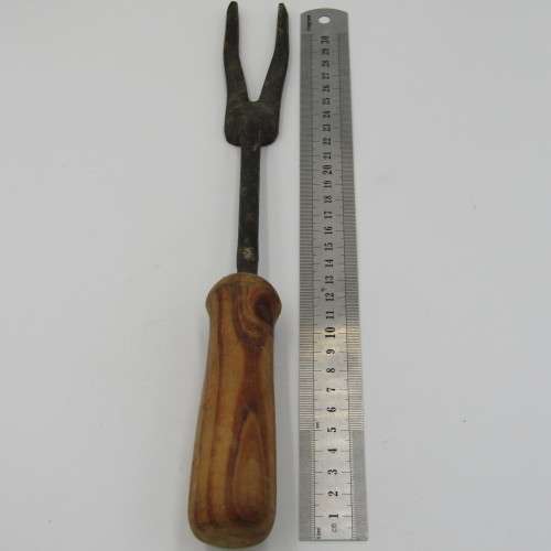 Vintage cast iron coal stove tool for lids