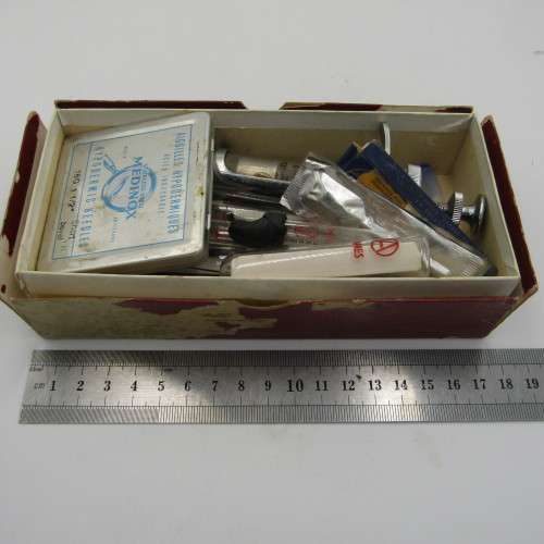 Vintage glass syringe with sealed Anacap Silk stitches in glass tubes
