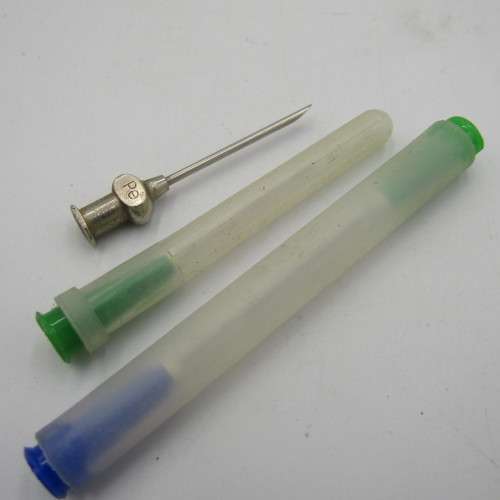 Vintage glass syringe with sealed Anacap Silk stitches in glass tubes