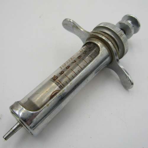 Vintage glass syringe with sealed Anacap Silk stitches in glass tubes