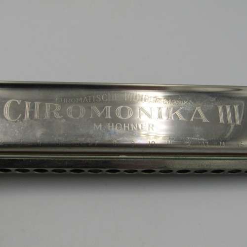 Vintage Hohner Chromika III harmonica in case
