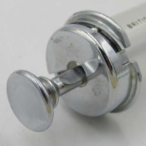 The New Everett glass syringe in box with 2 tins of needles