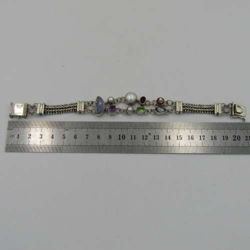 Sterling silver bracelet with pearls, opal stone, garnets, amethyst and other stones