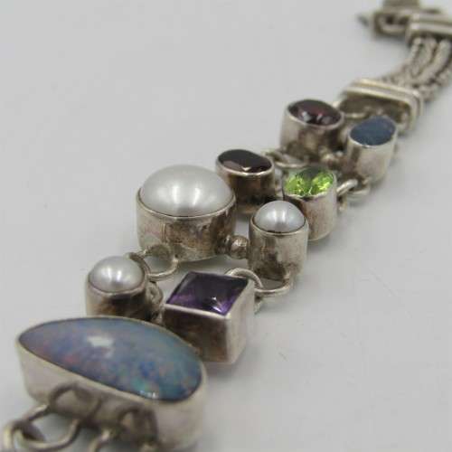 Sterling silver bracelet with pearls, opal stone, garnets, amethyst and other stones