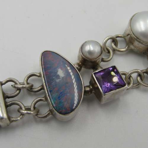 Sterling silver bracelet with pearls, opal stone, garnets, amethyst and other stones