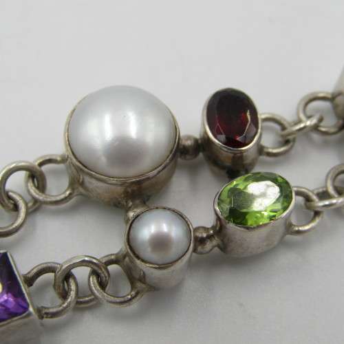 Sterling silver bracelet with pearls, opal stone, garnets, amethyst and other stones