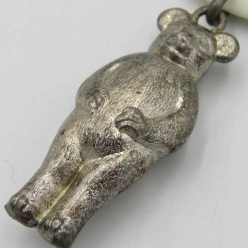 Antique baby rattle / teething ring with silverplated bear