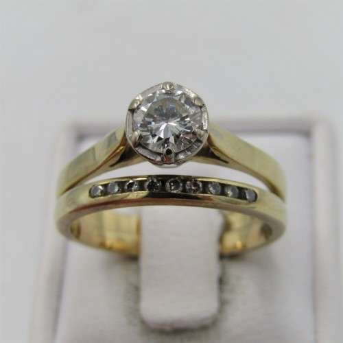 9kt Yellow Gold diamond ring wedding set with about 0,70ct diamond