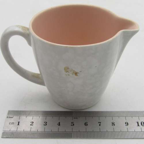 Vintage Poole milk / cream jug with pink inside