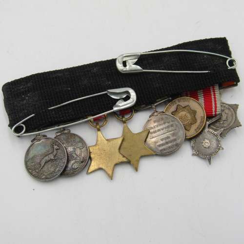 Set of 8 WW2 and SA Police miniature medals with North Africa rossette and commendation leaf