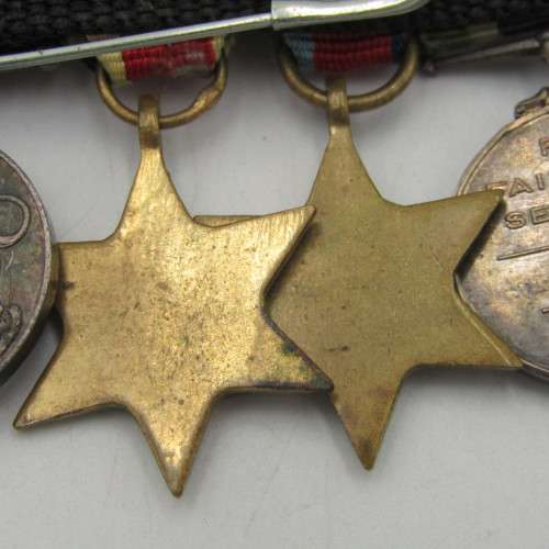 Set of 8 WW2 and SA Police miniature medals with North Africa rossette and commendation leaf
