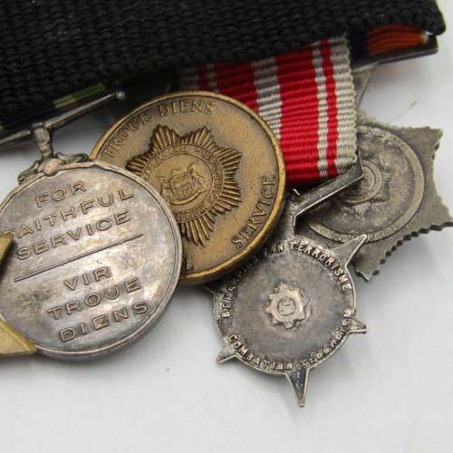 Set of 8 WW2 and SA Police miniature medals with North Africa rossette and commendation leaf