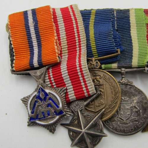 Set of 8 WW2 and SA Police miniature medals with North Africa rossette and commendation leaf
