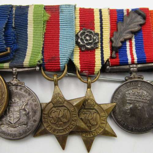 Set of 8 WW2 and SA Police miniature medals with North Africa rossette and commendation leaf
