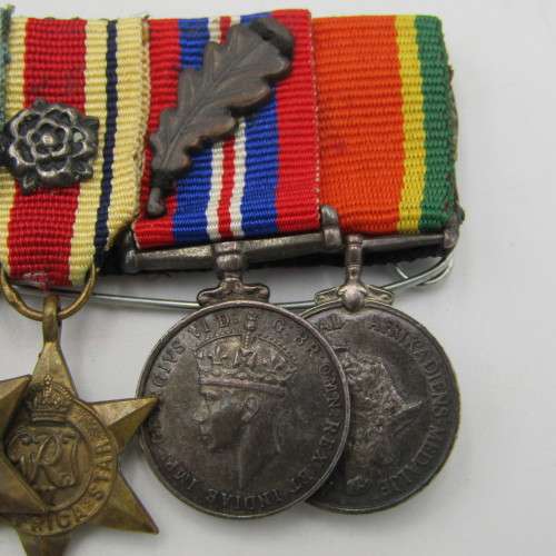 Set of 8 WW2 and SA Police miniature medals with North Africa rossette and commendation leaf