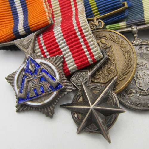 Set of 8 WW2 and SA Police miniature medals with North Africa rossette and commendation leaf