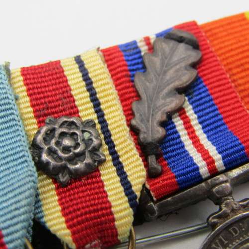 Set of 8 WW2 and SA Police miniature medals with North Africa rossette and commendation leaf