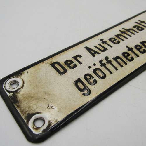 Vintage German enamel sign - `It is forbidden to remain on the stage when the bars are open`