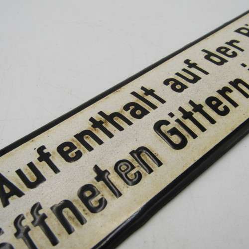 Vintage German enamel sign - `It is forbidden to remain on the stage when the bars are open`