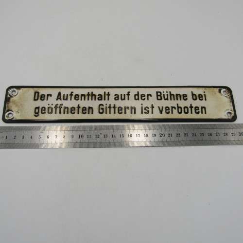 Vintage German enamel sign - `It is forbidden to remain on the stage when the bars are open`