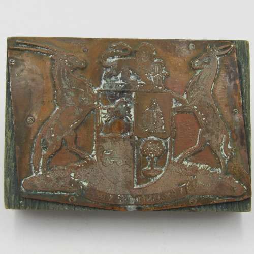 Old South African coat of arms copper printing plate on wooden block