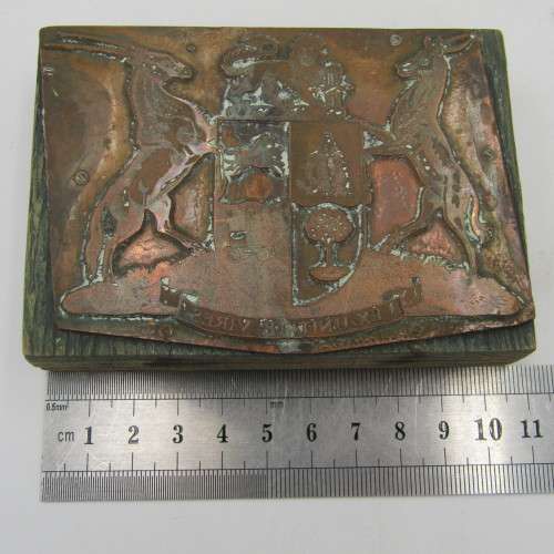 Old South African coat of arms copper printing plate on wooden block