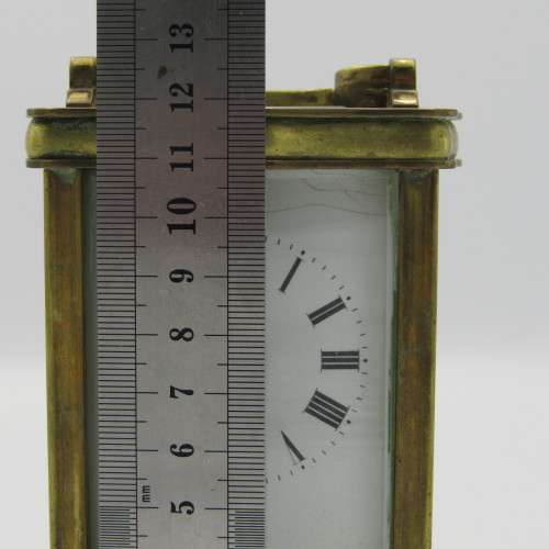 Antique brass carriage clock in original case - runs and stops