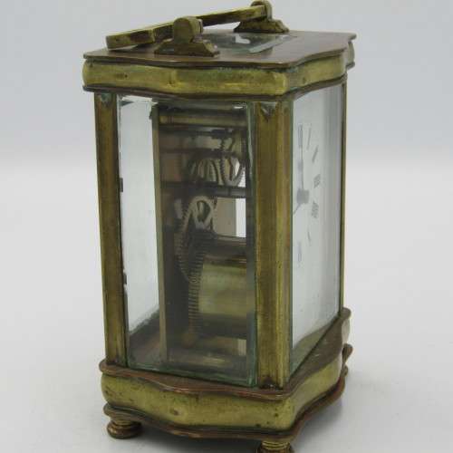 Antique brass carriage clock in original case - runs and stops