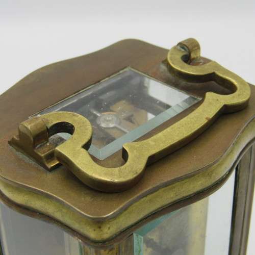 Antique brass carriage clock in original case - runs and stops