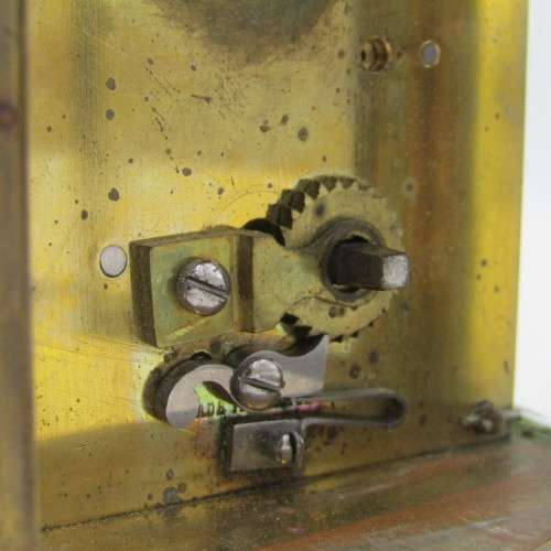 Antique brass carriage clock in original case - runs and stops