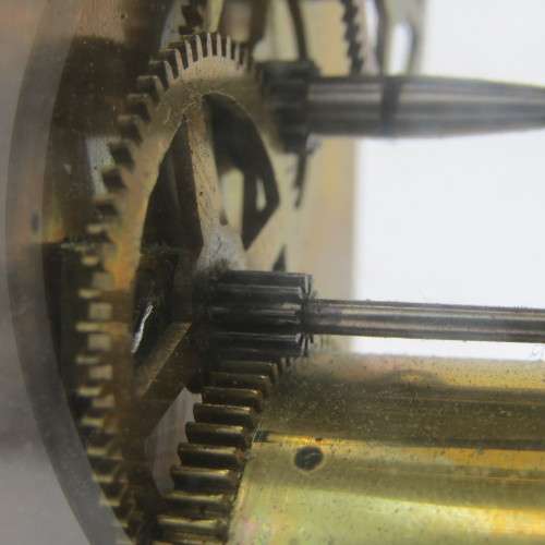 Antique brass carriage clock in original case - runs and stops