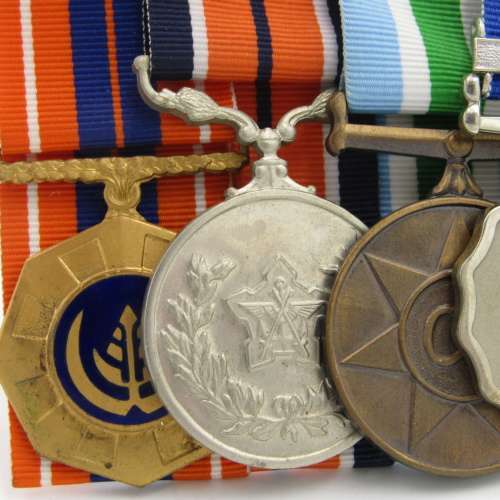 Medal set of SA Air Force Rooivalk and 6 ASU crew member Freddie Nortje plus badges