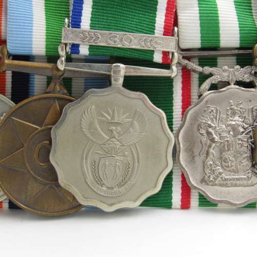 Medal set of SA Air Force Rooivalk and 6 ASU crew member Freddie Nortje plus badges