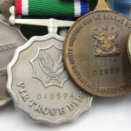 Medal set of SA Air Force Rooivalk and 6 ASU crew member Freddie Nortje plus badges