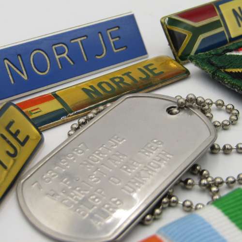 Medal set of SA Air Force Rooivalk and 6 ASU crew member Freddie Nortje plus badges