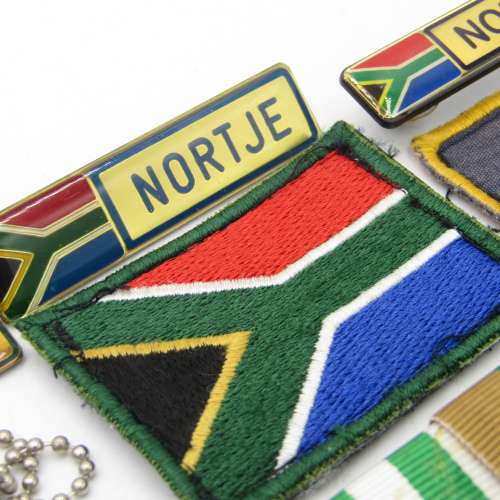 Medal set of SA Air Force Rooivalk and 6 ASU crew member Freddie Nortje plus badges