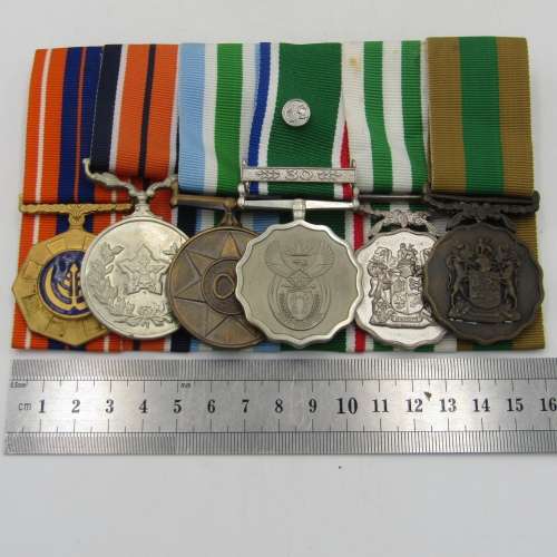 Medal set of SA Air Force Rooivalk and 6 ASU crew member Freddie Nortje plus badges