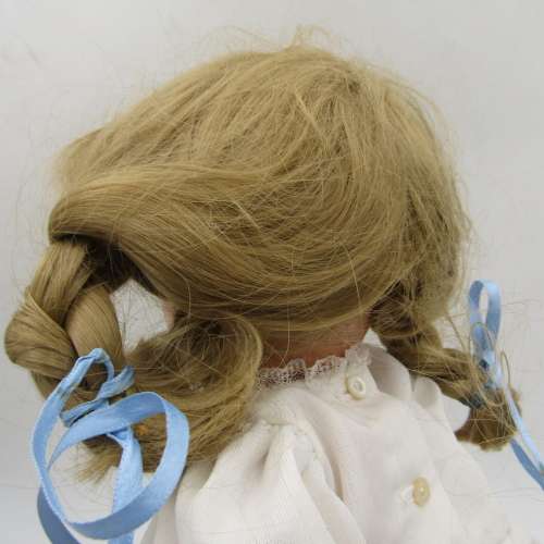 Antique Composition doll with clothing