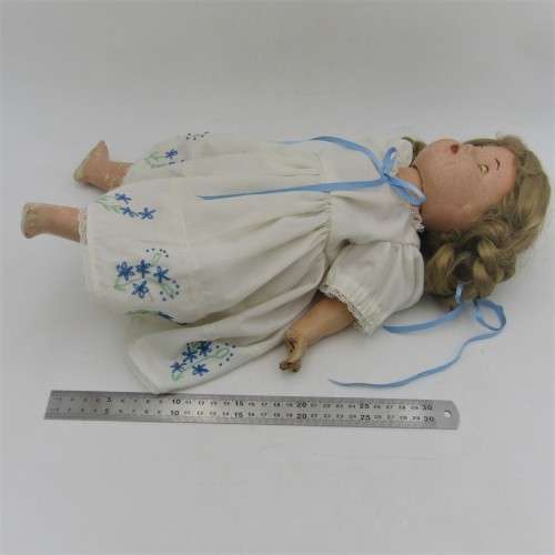 Antique Composition doll with clothing