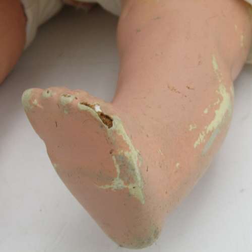 Antique Composition doll with clothing