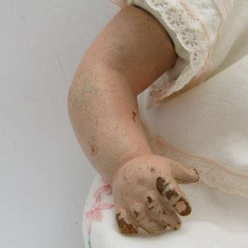 Antique Composition doll with clothing