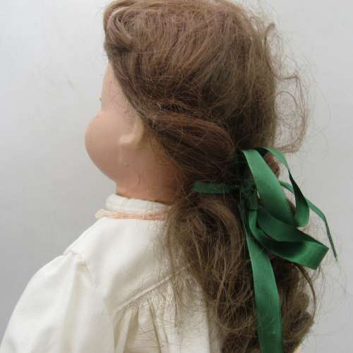 Antique Composition doll with clothing