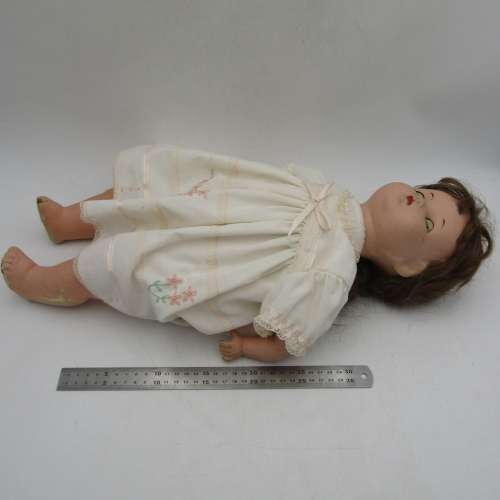 Antique Composition doll with clothing