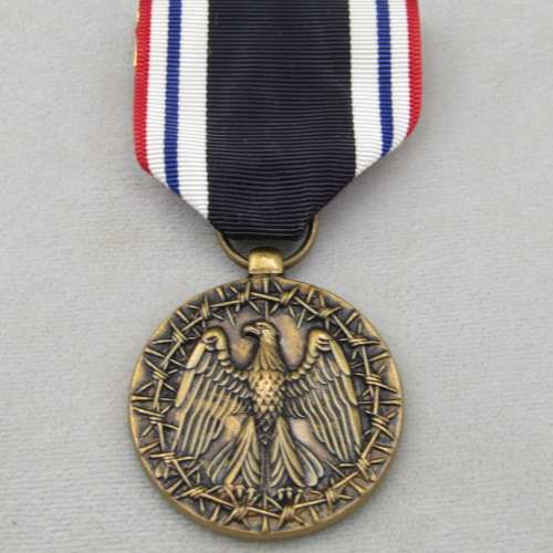 US Prisoner of War honorable service medal and ribbon bars in original box