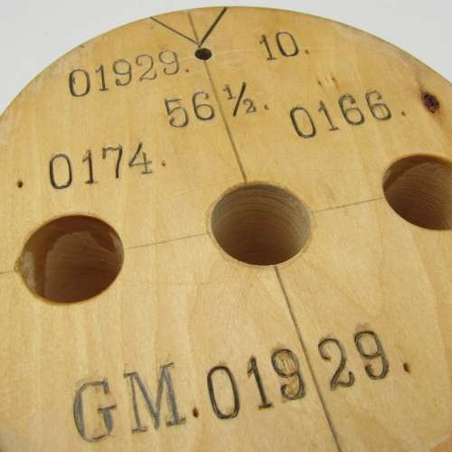 Antique wooden hat form with various markings