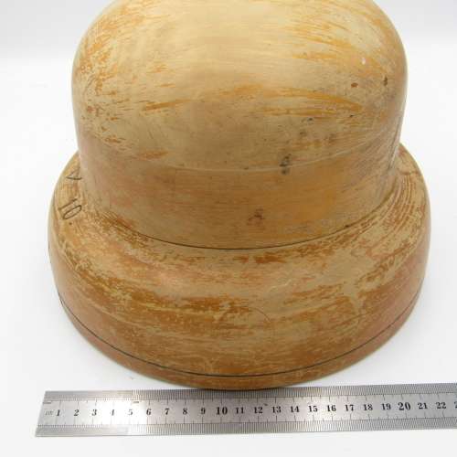 Antique wooden hat form with various markings